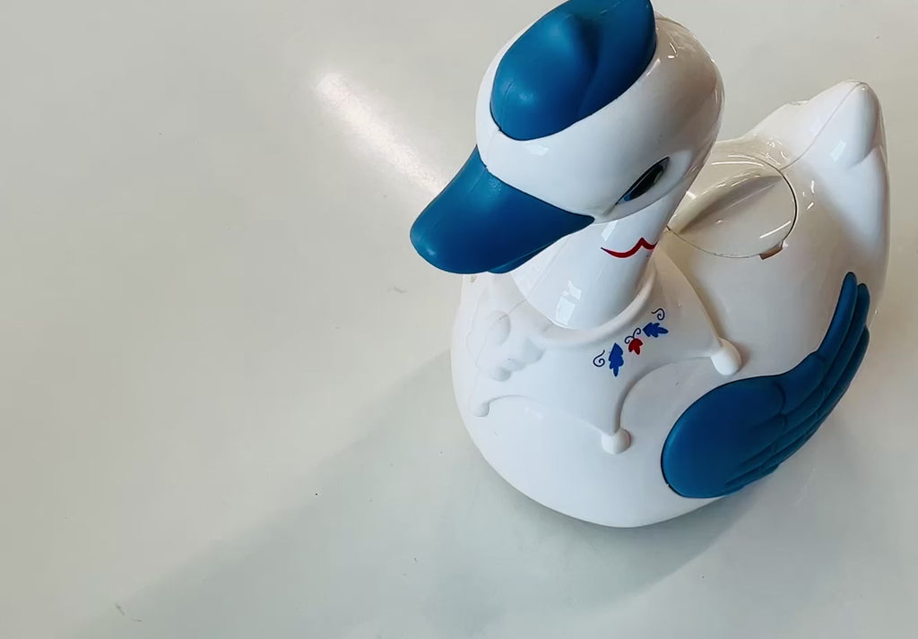 Electric Crawl Goose Toy with Music & Lights – Egg-Laying Fun